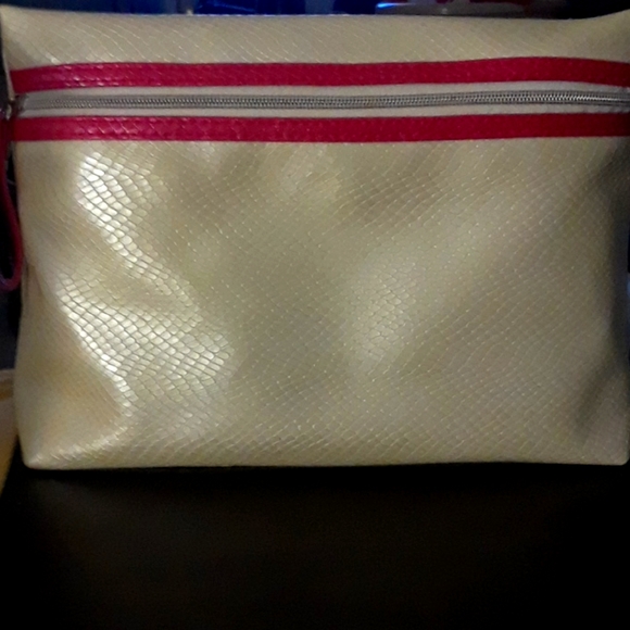 Lancome Handbags - New snake print Lancome makeup bag